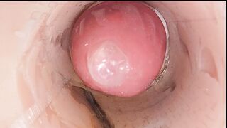 The camera in the deep pussy records a huge ejaculation of sperm into the condom