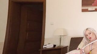 Solo blonde with big tits Jarushka Ross masturbates with a toy and moans with her legs spread in VR.